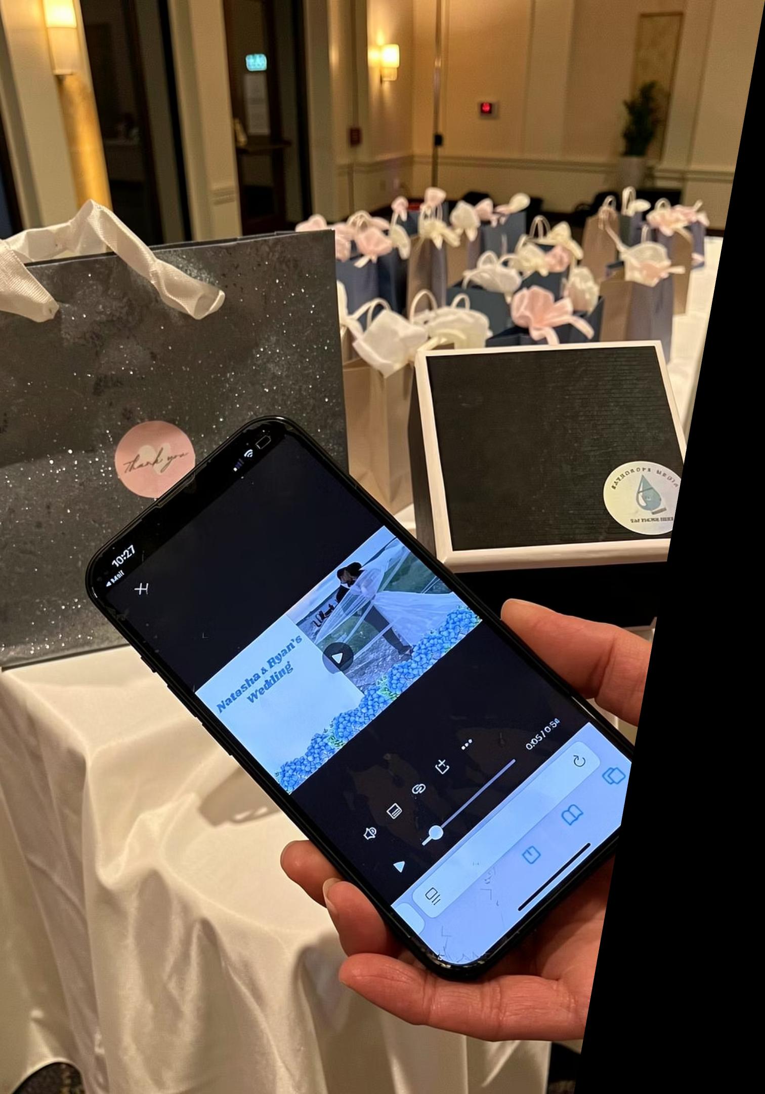Wedding guest tapping phone to NFC gift bag